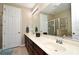 Bathroom with double sinks, a shower, and a bathtub at 1720 Garden Sage Dr, Oviedo, FL 32765