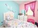 bedroom with twin bed and dresser at 1720 Garden Sage Dr, Oviedo, FL 32765