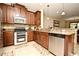 Well-equipped kitchen with granite countertops and ample cabinetry at 1720 Garden Sage Dr, Oviedo, FL 32765