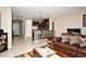 Open concept living room with kitchen view and comfortable seating at 1720 Garden Sage Dr, Oviedo, FL 32765