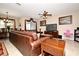 Relaxing living room featuring a large sectional sofa and flat-screen TV at 1720 Garden Sage Dr, Oviedo, FL 32765