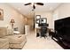 Open loft area with a desk and comfy seating at 1720 Garden Sage Dr, Oviedo, FL 32765