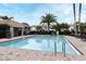Community pool with surrounding patio furniture at 1720 Garden Sage Dr, Oviedo, FL 32765