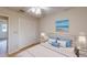 Cozy bedroom with neutral decor and large closet at 403 Tranquille Oaks Dr, Ocoee, FL 34761