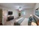 Spacious main bedroom offering ample closet space and a ceiling fan at 403 Tranquille Oaks Dr, Ocoee, FL 34761