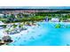 Aerial view of Crystal Lagoon community with resort-style amenities at 4704 Homestead Trl, St Cloud, FL 34772