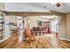 Spacious dining room with stylish light fixture and wood flooring at 4925 Cedarstone Ln, Orlando, FL 32822