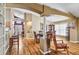 Large dining room with seating for six and view to front entry at 4925 Cedarstone Ln, Orlando, FL 32822