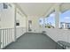 Large outdoor balcony offers ample space for outdoor seating and relaxing with a view of the neighborhood at 1379 Kiawah St, Celebration, FL 34747