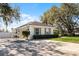 Well-kept home with a long driveway and manicured landscaping at 1845 Farrington Dr, Lakeland, FL 33809