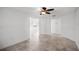 Spacious living room with tile floors, recessed lighting, and open floor plan at 1845 Farrington Dr, Lakeland, FL 33809