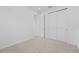 Bright bedroom with ample closet space, neutral colors, and natural light at 2740 Sweet Acacia Dr, Clermont, FL 34711
