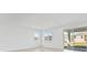 Bright living room with sliding glass doors that fill the home with natural light and offer outdoor access at 2740 Sweet Acacia Dr, Clermont, FL 34711