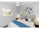 Nicely staged main bedroom features large windows with good natural light at 2913 Joyann St, Orlando, FL 32810