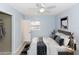 Cozy bedroom with a ceiling fan, closet space, and soft lighting, creating a comfortable and inviting atmosphere at 2913 Joyann St, Orlando, FL 32810