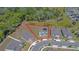 Aerial view of a lovely home with solar panels, nestled in a private cul-de-sac at 678 Fiddlesticks Dr, Davenport, FL 33837