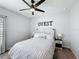 Guest bedroom with inviting decor featuring a comfortable bed and stylish nightstands at 678 Fiddlesticks Dr, Davenport, FL 33837
