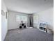 Cozy Bedroom with two windows, reading nook, and a collection of colorful books at 678 Fiddlesticks Dr, Davenport, FL 33837