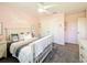 Pink bedroom featuring a ceiling fan, closet, and decorated in a stylish manner at 678 Fiddlesticks Dr, Davenport, FL 33837