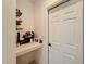 Compact office nook area with a built-in desk and convenient storage shelves at 678 Fiddlesticks Dr, Davenport, FL 33837