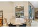 Bright breakfast nook features a round table and chairs, offering a cozy space at 3954 Old Dunn Rd, Apopka, FL 32712