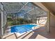 Inviting screened pool area, perfect for outdoor relaxation at 3954 Old Dunn Rd, Apopka, FL 32712