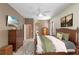 Bright Primary bedroom with ensuite bathroom and walk-in closet at 3954 Old Dunn Rd, Apopka, FL 32712