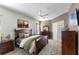 Spacious Primary bedroom with a king-size bed and ensuite bathroom at 3954 Old Dunn Rd, Apopka, FL 32712