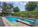 Refreshing pool and spa, complete with lush landscaping for backyard tranquility and total privacy at 471 Lasso Dr, Kissimmee, FL 34747