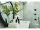 Elegant bathroom featuring marble walls, modern fixtures, and stylish decorative accents at 2661 Via Tuscany, Winter Park, FL 32789