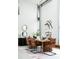 Airy dining room with modern furnishings, tall ceilings, stylish abstract wall art, and plenty of natural light at 2661 Via Tuscany, Winter Park, FL 32789