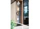 Modern kitchen with sleek cabinetry, stainless steel appliances, and custom shelving with accent lighting at 2661 Via Tuscany, Winter Park, FL 32789