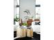 Open living room showcases stylish furniture, bold decor, large windows, and ample natural light at 2661 Via Tuscany, Winter Park, FL 32789