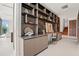 Custom office space with built-in shelving, marble countertops, and a stylish design for a productive workspace at 2661 Via Tuscany, Winter Park, FL 32789