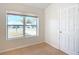 Bright dining area with large window and view of the street at 28 Spring Loop Cir, Ocala, FL 34472