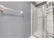 Clean bathroom with a shower stall and gray walls at 2891 Upper Park Rd, Orlando, FL 32814