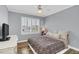 Cozy bedroom featuring a comfortable bed and a TV at 2891 Upper Park Rd, Orlando, FL 32814