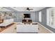 Bright and airy living room with comfortable seating and large TV at 2891 Upper Park Rd, Orlando, FL 32814