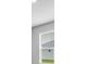 Bedroom window with blinds and walls painted in a light grey at 2982 Arranmore Dr, Ormond Beach, FL 32174