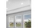 Bright room featuring three large windows offering pleasant views and natural light at 2982 Arranmore Dr, Ormond Beach, FL 32174