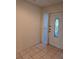 Front entry with tiled floor and glass door at 622 Riverview Ave, Altamonte Springs, FL 32714