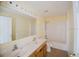 Full bathroom with double sink vanity, bathtub, and neutral wall color at 2824 Corrigan Dr, Deltona, FL 32738
