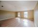 Bright bedroom with vaulted ceiling and natural light from two windows at 2824 Corrigan Dr, Deltona, FL 32738