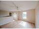 Bright living room with laminate wood flooring, neutral walls, and natural light at 2824 Corrigan Dr, Deltona, FL 32738
