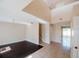 Inviting living room with dark wood floors, neutral walls, and a chandelier at 2824 Corrigan Dr, Deltona, FL 32738