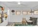 Versatile bonus room with white wood paneling, wood floors, and bright natural light at 786 Antonette Ave, Winter Park, FL 32789