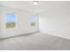 Spacious bedroom filled with natural light, ideal for relaxation and comfort at 16332 Happy Eagle Dr, Clermont, FL 34714