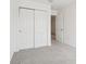 Bedroom with carpet and closet for organized storage with easy access at 16332 Happy Eagle Dr, Clermont, FL 34714