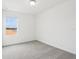 Bright bedroom featuring a window and neutral carpet, perfect for relaxation and comfort at 16332 Happy Eagle Dr, Clermont, FL 34714