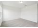 Spacious bedroom featuring plush carpeting and neutral paint at 16332 Happy Eagle Dr, Clermont, FL 34714